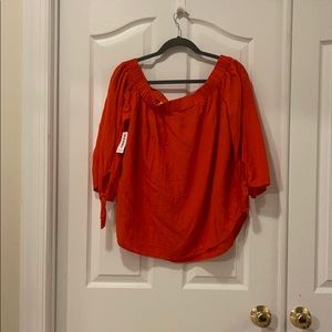 Orange off the shoulder blouse